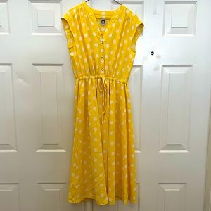 Sleeveless midi polka dot dress with adjustable waist